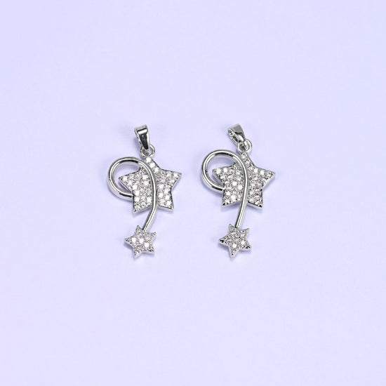 Shooting star charm with zircon pave stars and a swirling wire trail
