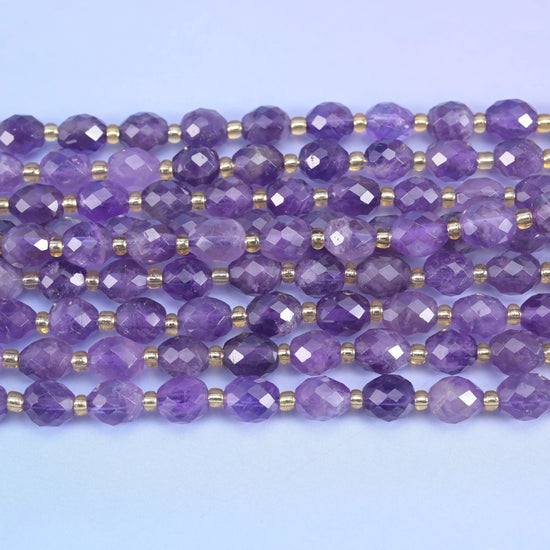 Faceted rice barrel cut amethyst beads