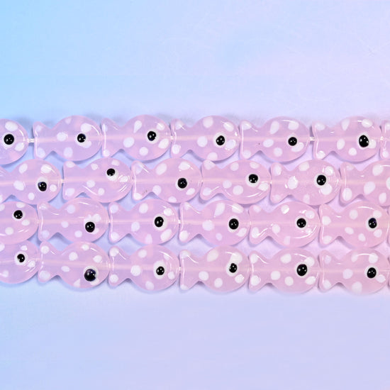 Fish glass beads in milky blush pink with white dots