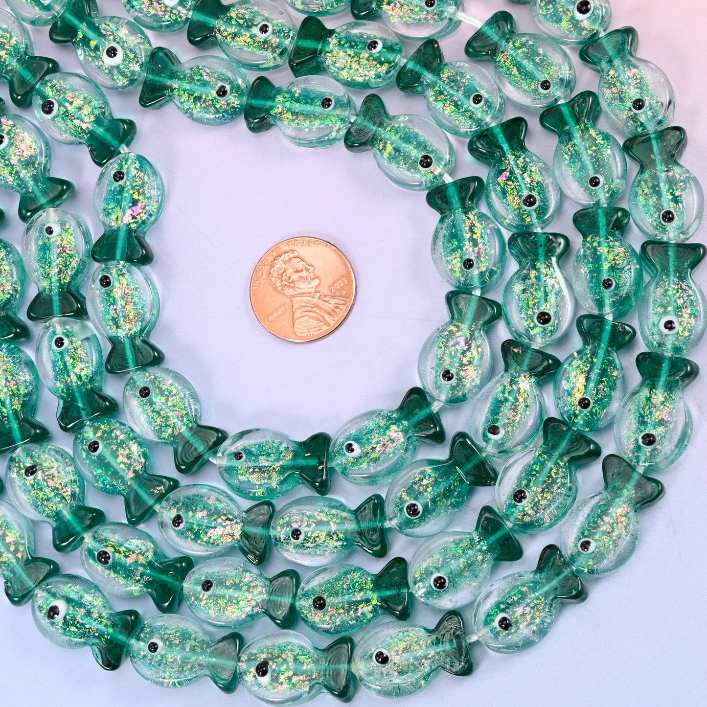 Iridescent Green Fish Glass Beads, 20 pieces per strand