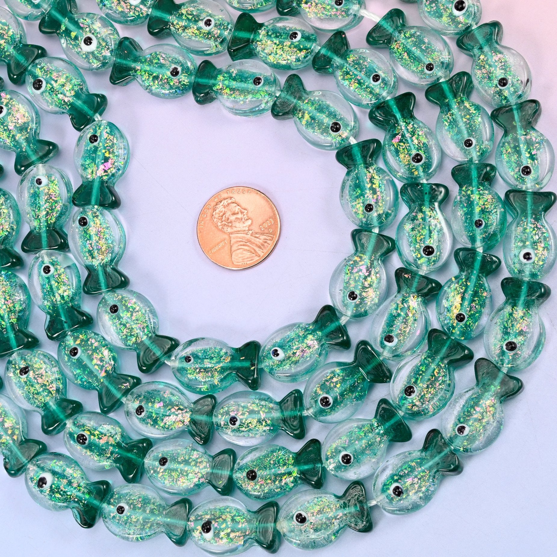 Iridescent Green Fish Glass Beads, 20 pieces per strand
