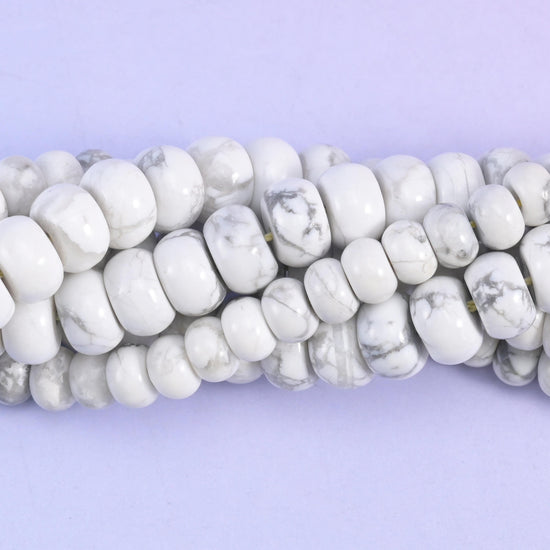 Rondelle cut White Howlite beads with a smooth polished finish