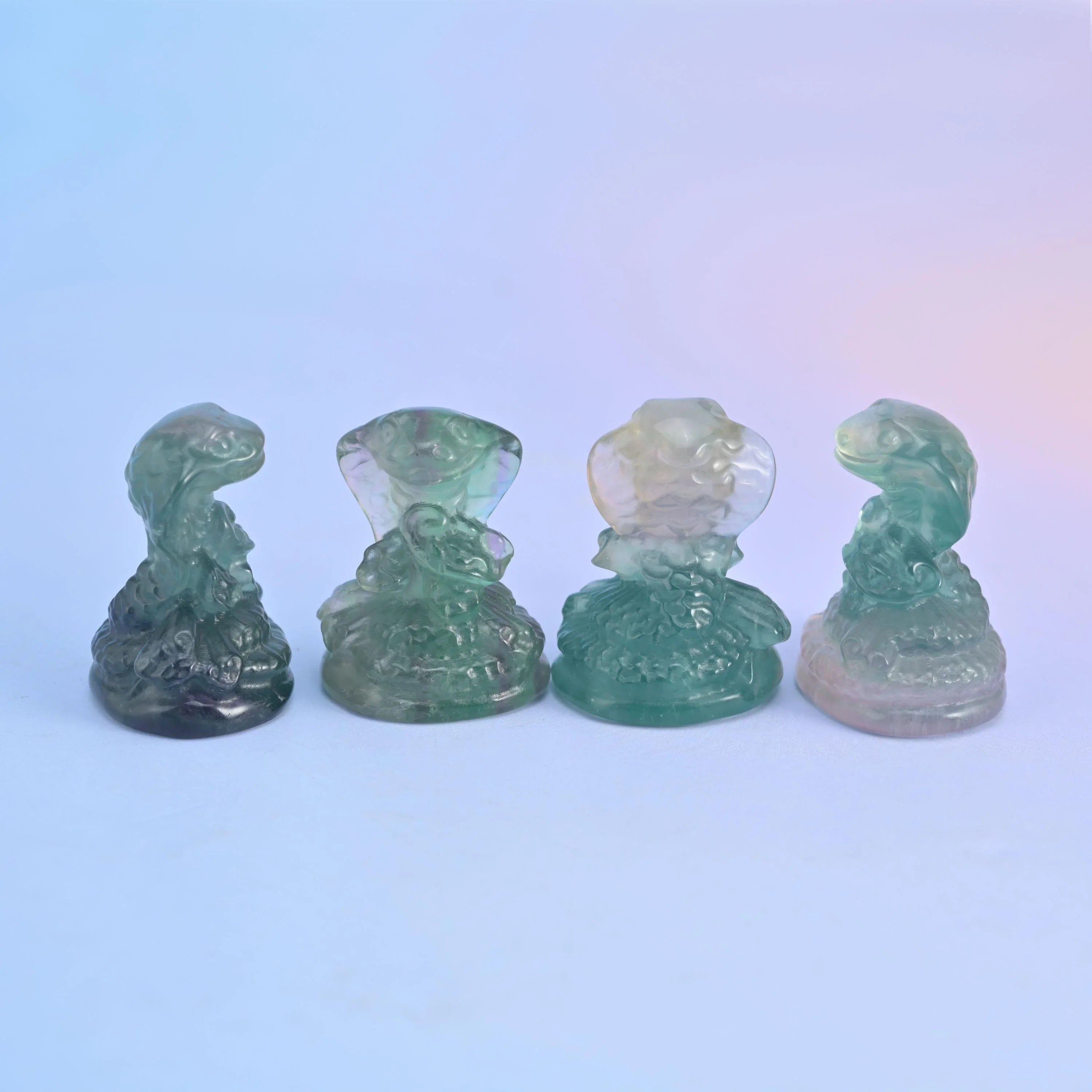Fluorite cobra snake figurine, sold per piece.