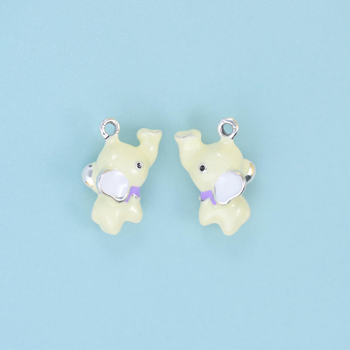 Two 18K white gold plated enamel elephant charms in pale yellow