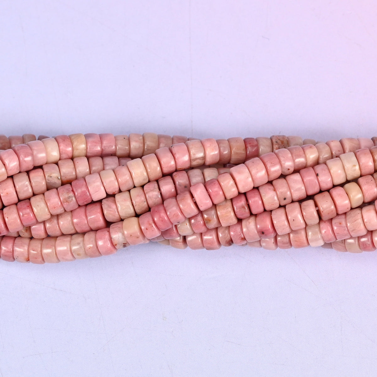 Pink Rhodonite Smooth Heishi Disc Beads for delicate necklaces.