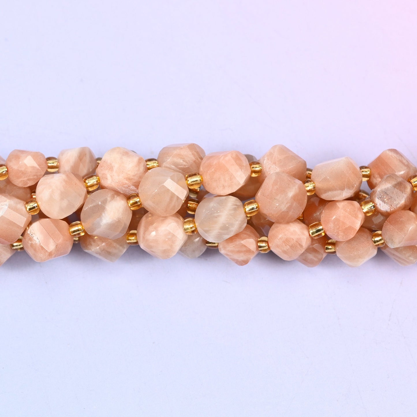Orange Sunstone beads, sold per 15 inch strand