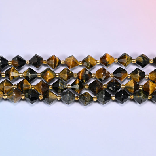 A single straight strand of 10mm Iron Tiger Eye faceted bicone beads laid flat, showing the full 15 inch length.