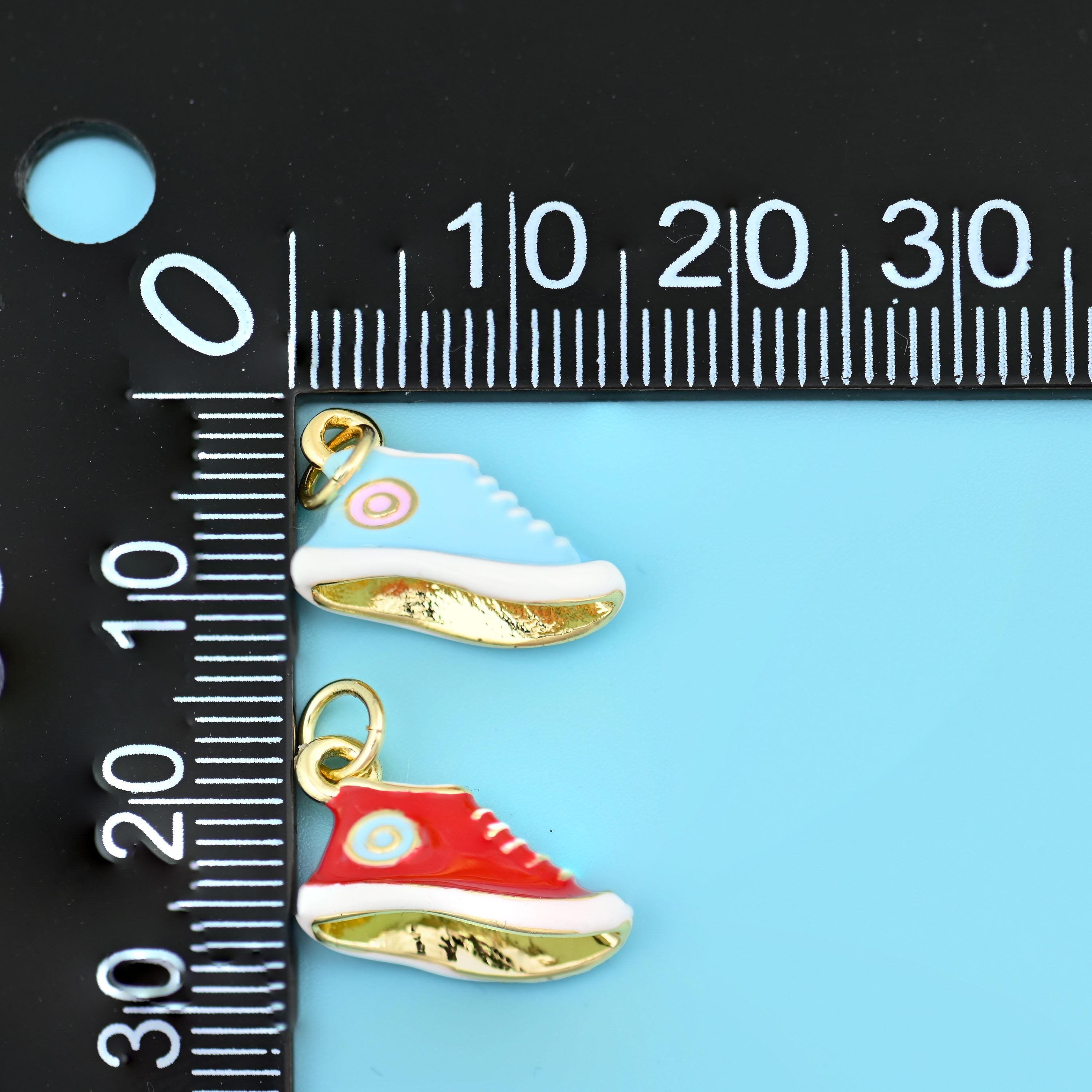 Enamel sneaker pendants in light blue and red, two 16.8x11mm high-top charms shown one above the other with gold jump rings and gold soles