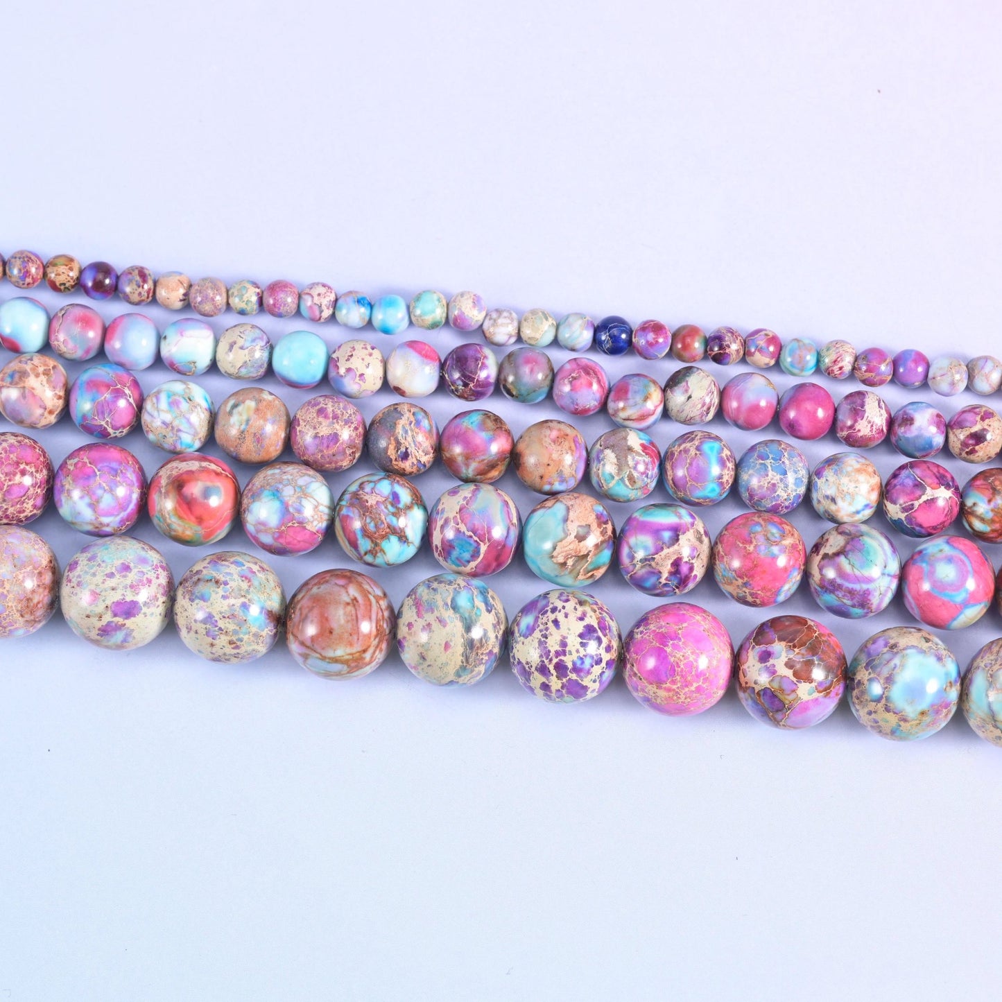 Sea sediment jasper round beads in rose pink, sky blue and lavender
