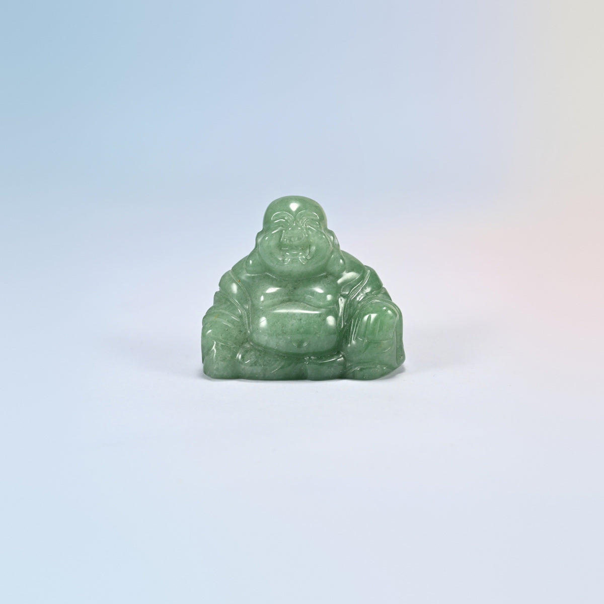 One green aventurine laughing Buddha crystal carving, soft green natural stone