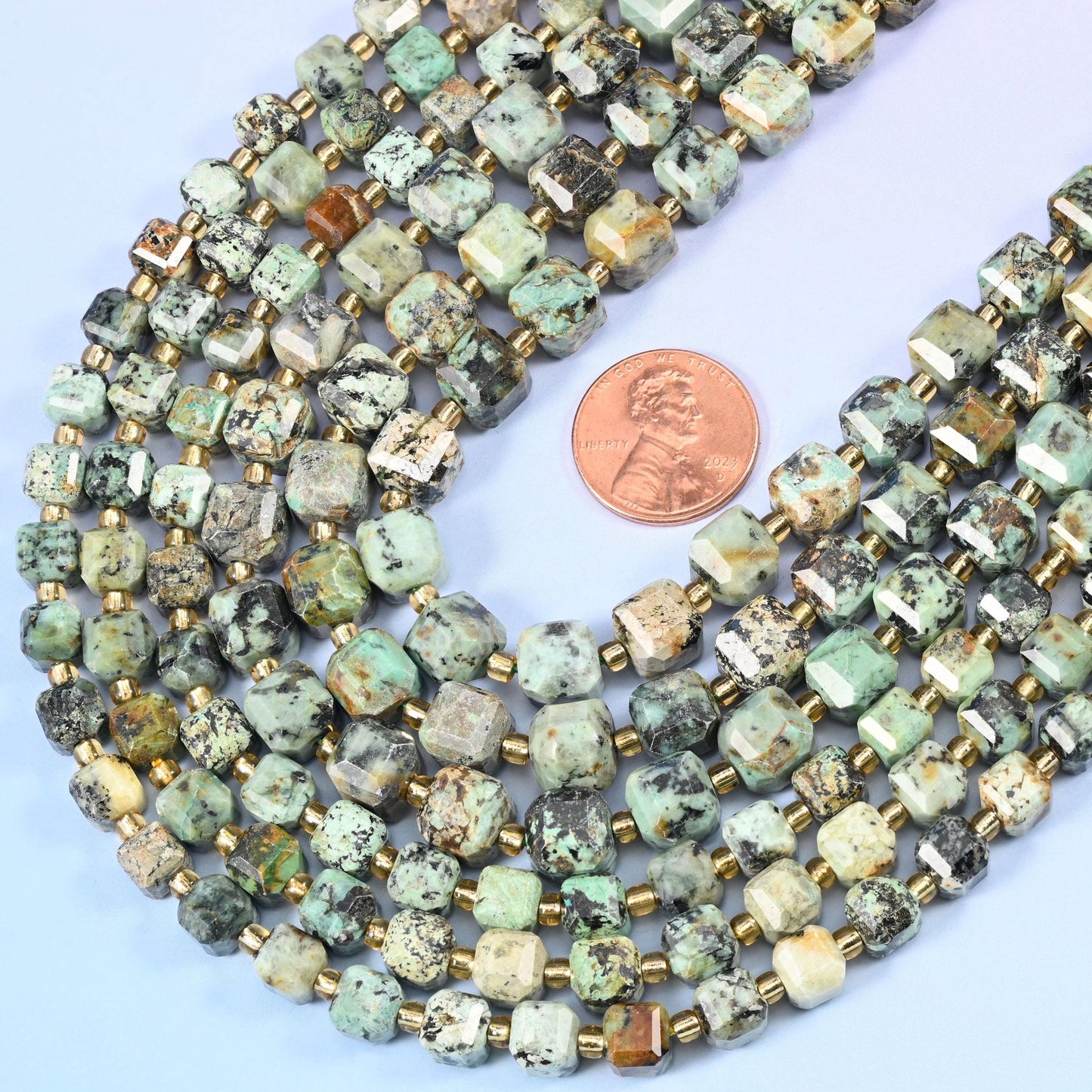 Faceted cube cut african howlite, green beads