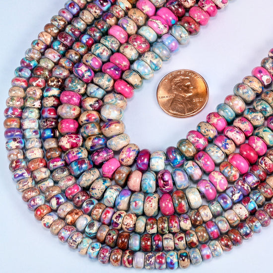 Flat rondelle beads in dyed Sea Sediment Jasper with dark mineral veining