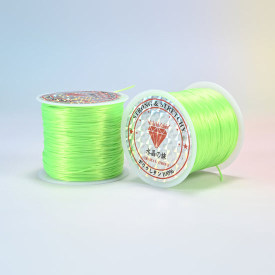 Two rolls of lime green 0.7-0.8mm elastic stretch string, glossy polyurethane bead cord with a holographic label
