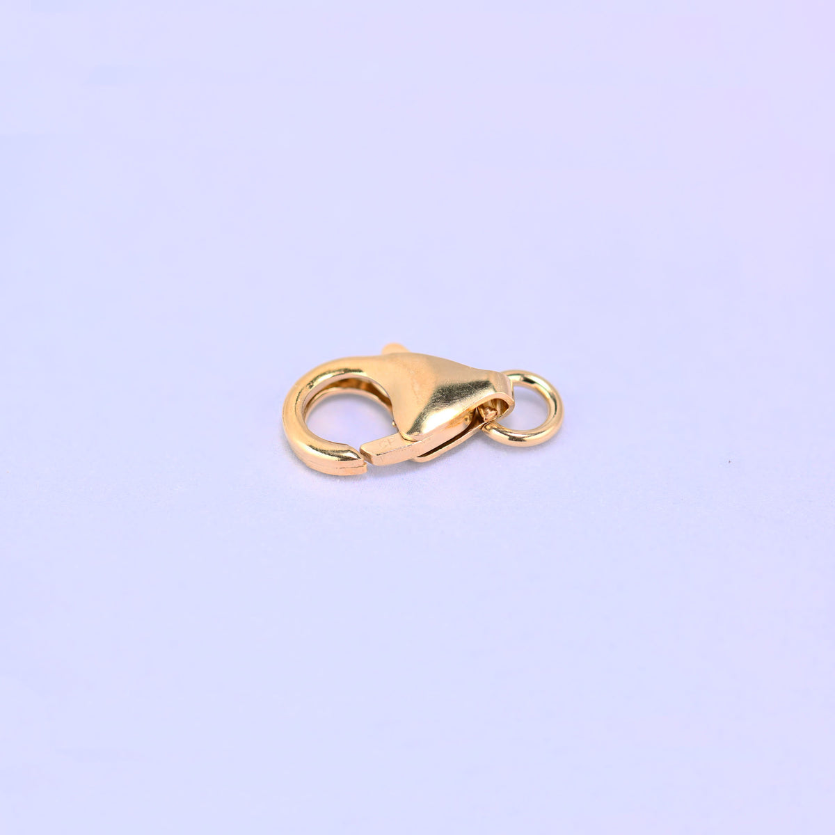 14K gold filled lobster clasp, 5x8.2mm, three-quarter view with the jump ring at the right