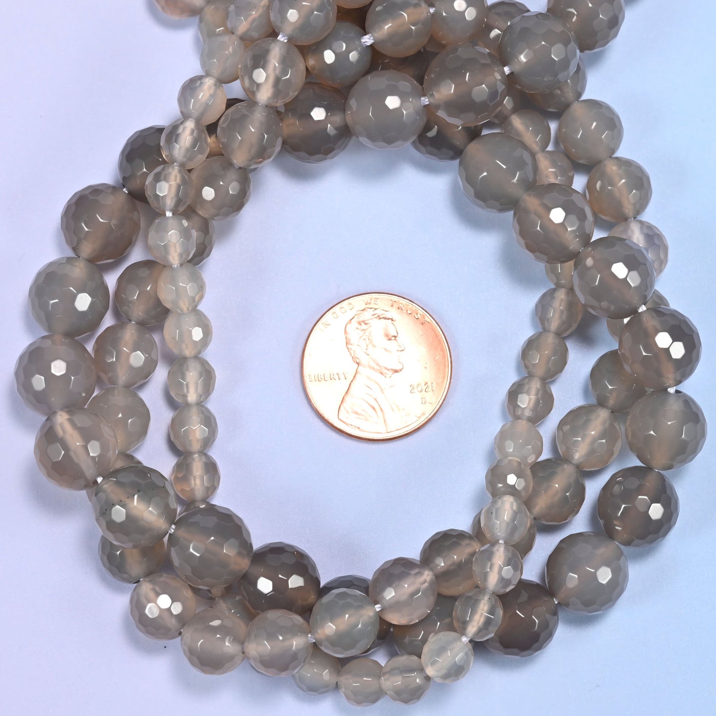 Gray agate faceted round beads in 6mm, 8mm, and 10mm, 15-inch strand, for jewelry making.