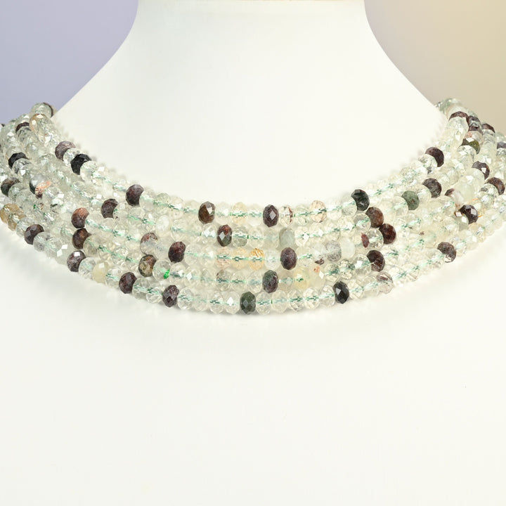 Green Phantom Quartz gemstone rondelle beads 4x6mm shown on a white neck display as a layered necklace