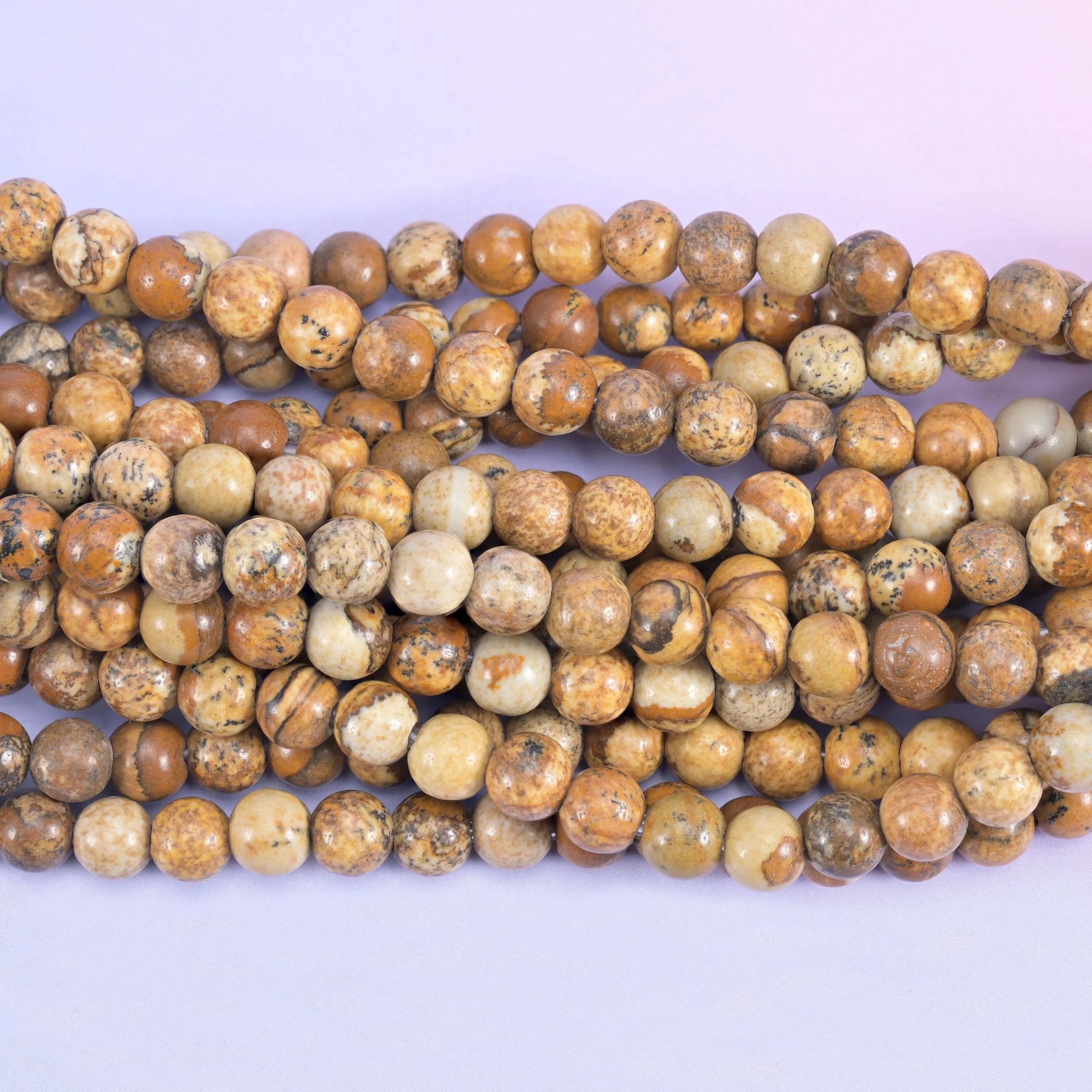 Smooth round cut picture jasper beads