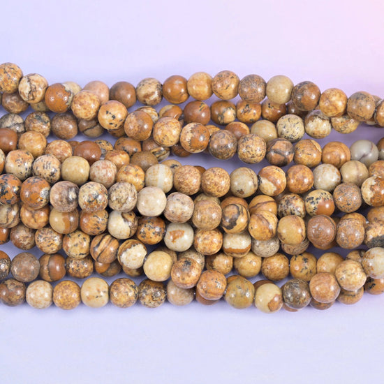 Smooth round cut picture jasper beads