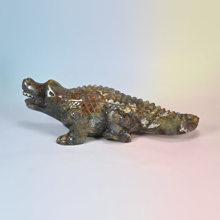 9 inch natural ocean agate crocodile carving, left side view with open jaw and carved scale plates