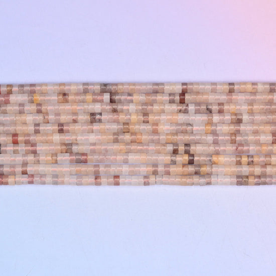 Lavender Quartz Smooth Heishi Disc Beads in peachy-pink and cream