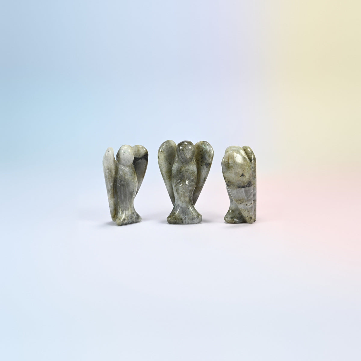 Three natural gray labradorite guardian angel carvings, gray-green with a soft flash, 2 inch