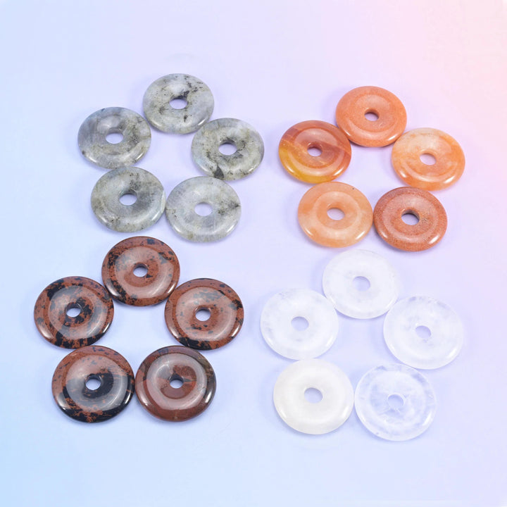 Donuts grouped in fours, speckled grey jasper, peach aventurine, brown mookaite and white quartz
