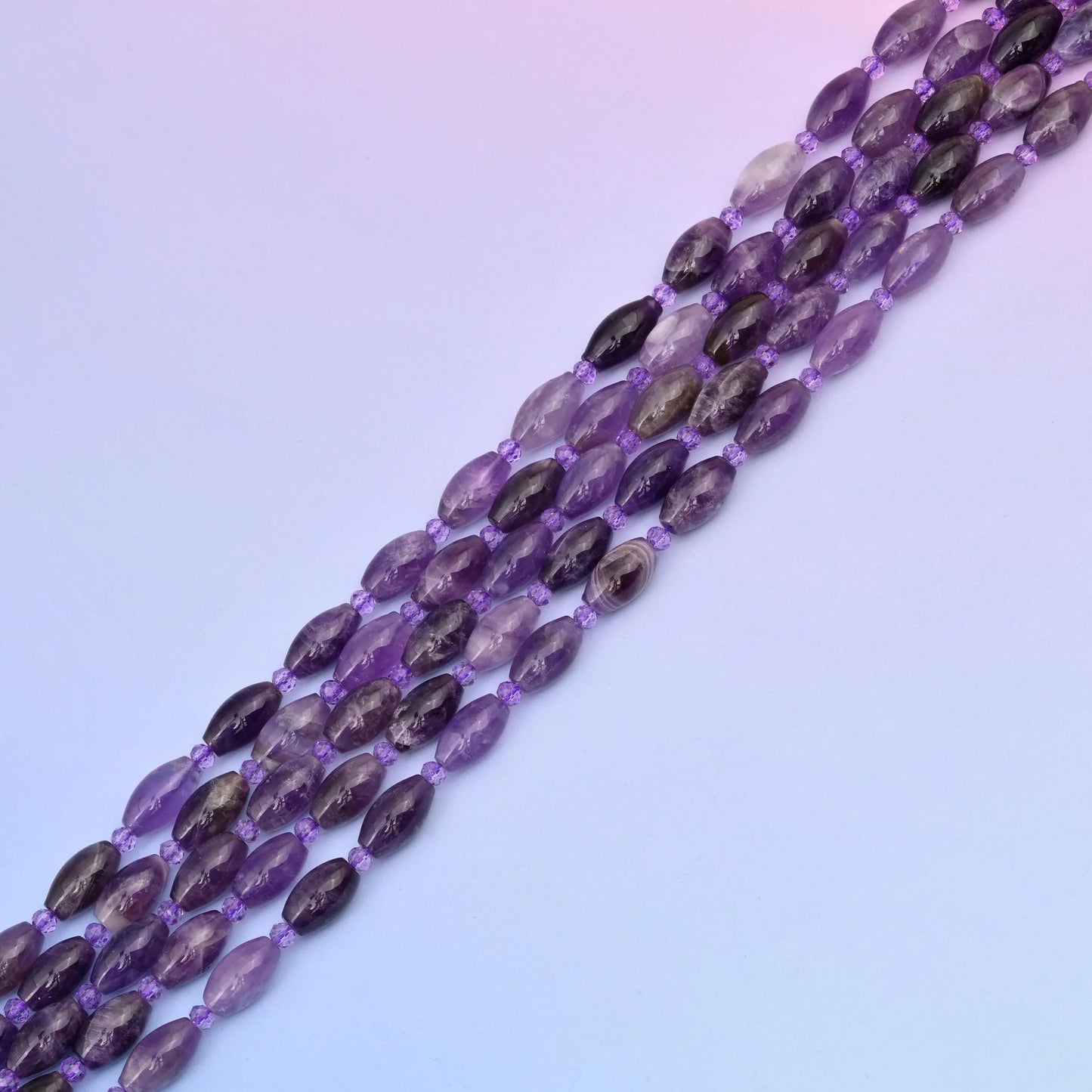 Amethyst beads in translucent lilac to grape violet