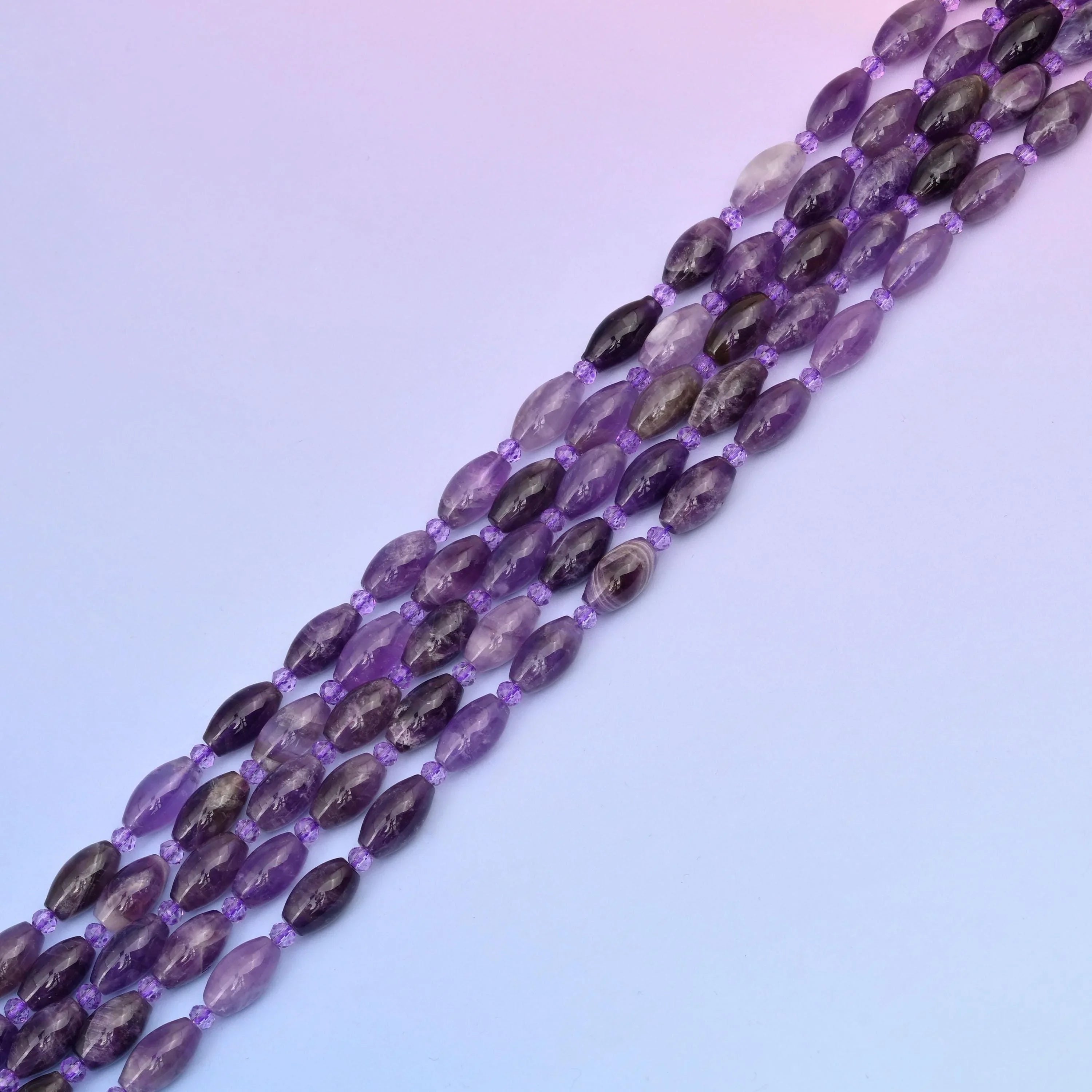 Amethyst beads in translucent lilac to grape violet
