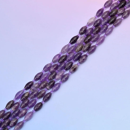 Amethyst beads in translucent lilac to grape violet