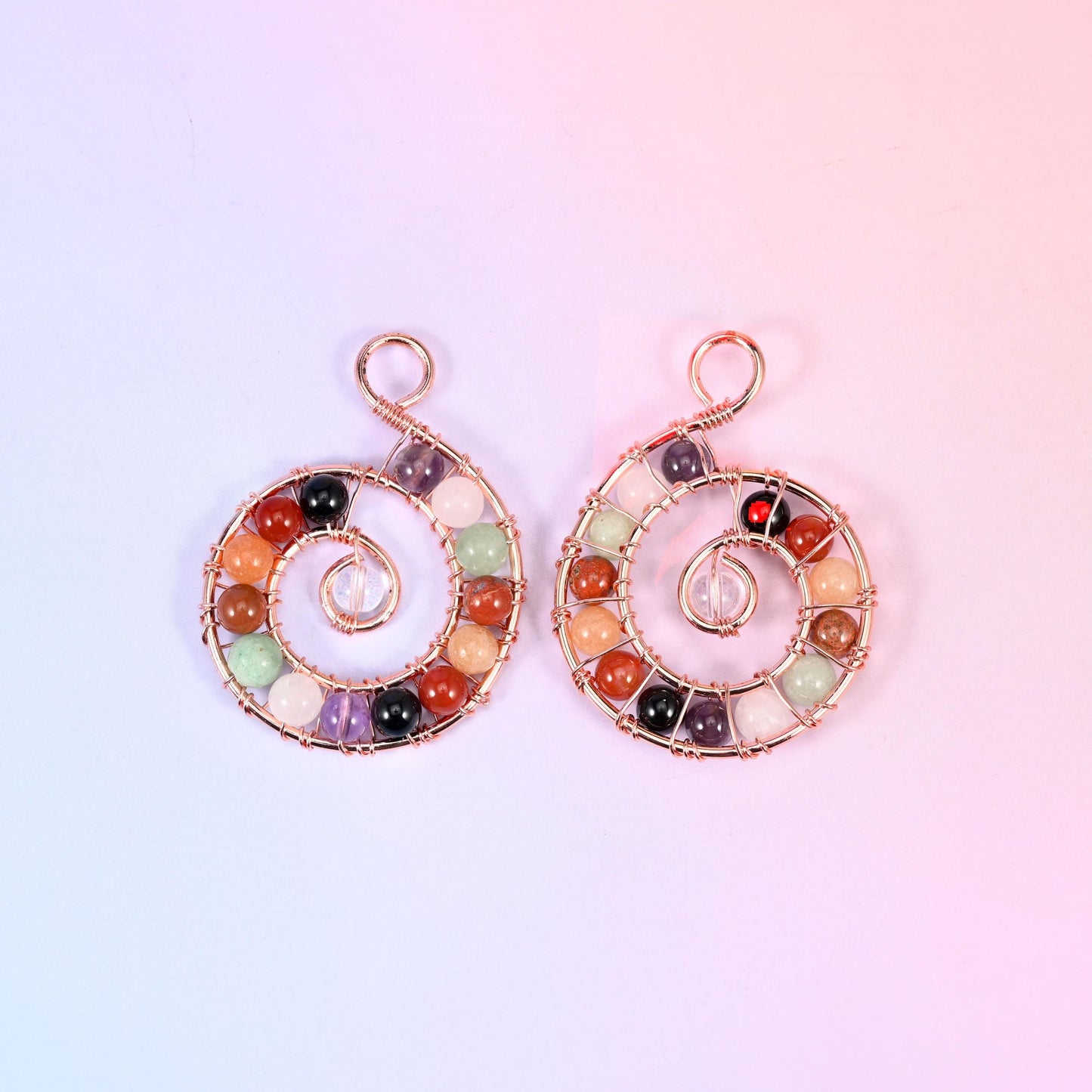 Chakra Gemstone Wired Spiral Pendant, a coiled wire spiral holding a ring of 6mm round gemstone beads