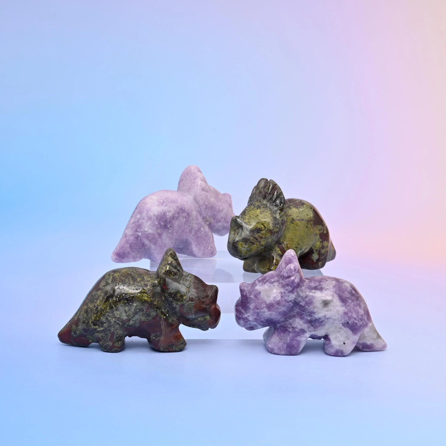 Triceratops crystal carving showing the stone's own colour and pattern