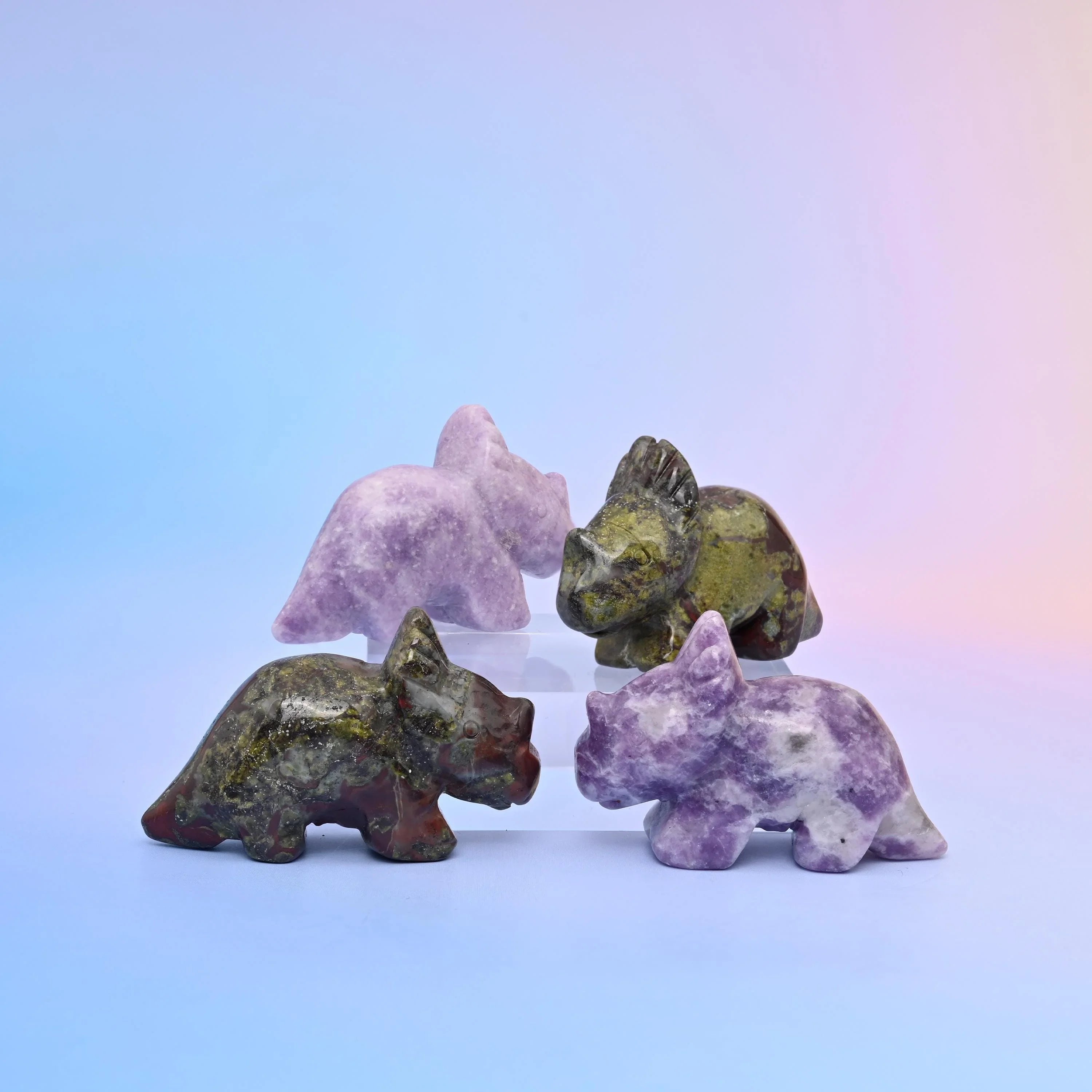 Triceratops crystal carving showing the stone's own colour and pattern