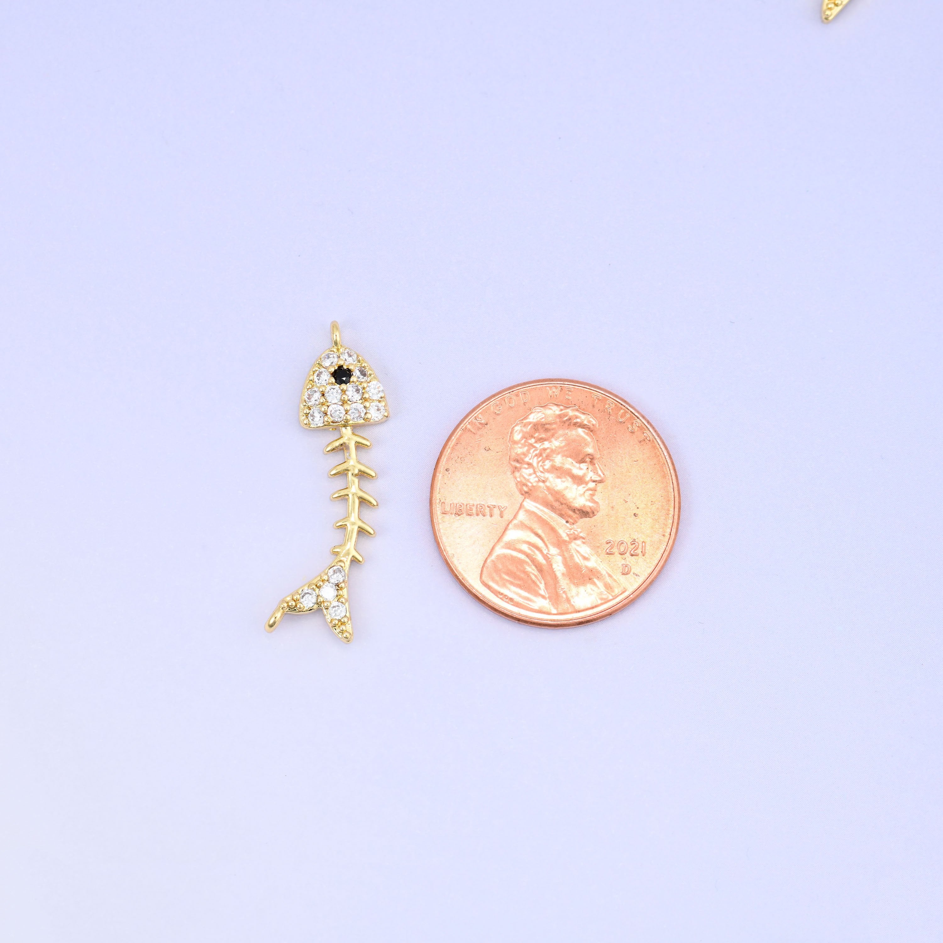 Fishbone Charm Pendant in gold and black