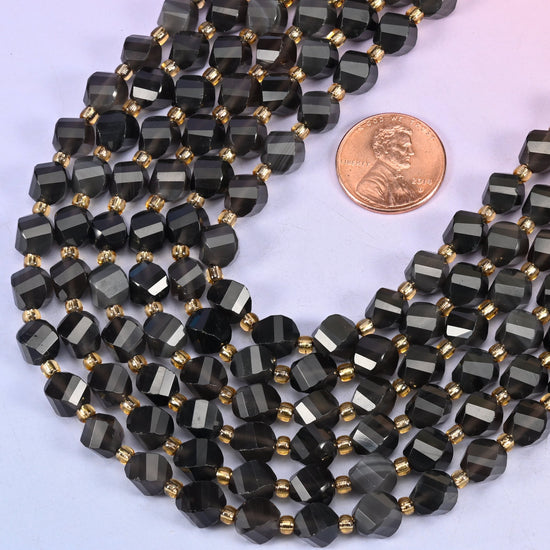 Ice obsidian natural stone beads with small gold spacer beads set between each 8mm faceted bead