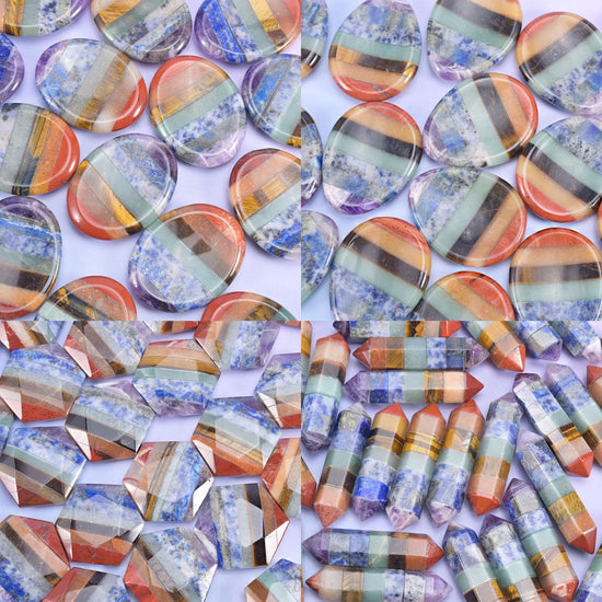 Close detail of polished coin worry stones and hexagon point towers, each striped with blue, cream, amber and rust bands