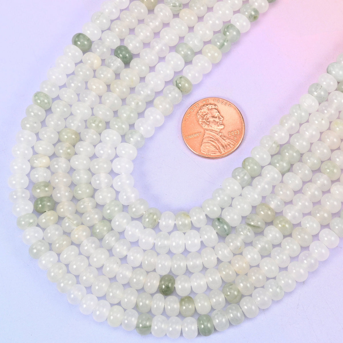 Smooth rondelle cut Tianshan Jade beads