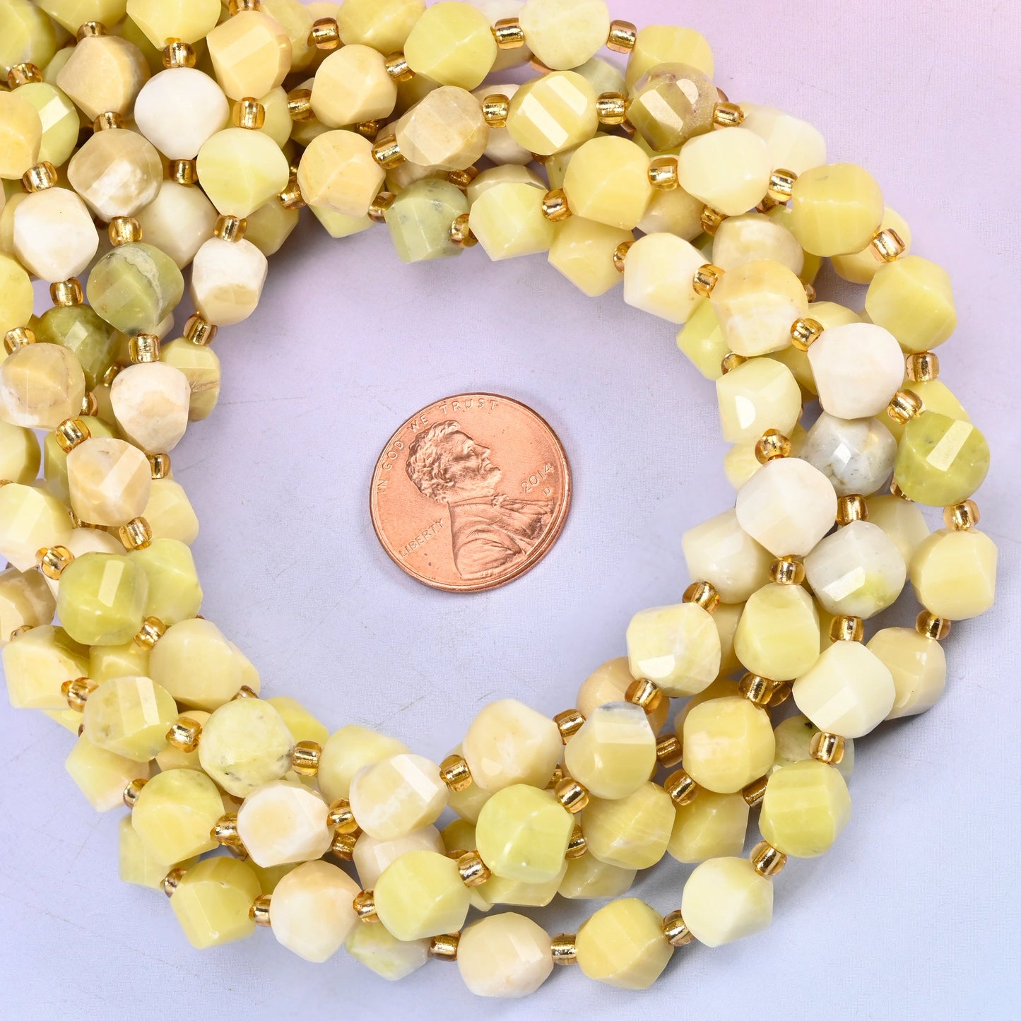 Lemon Jade yellow jade beads, 8mm spiral twist beads with colour variation from bead to bead