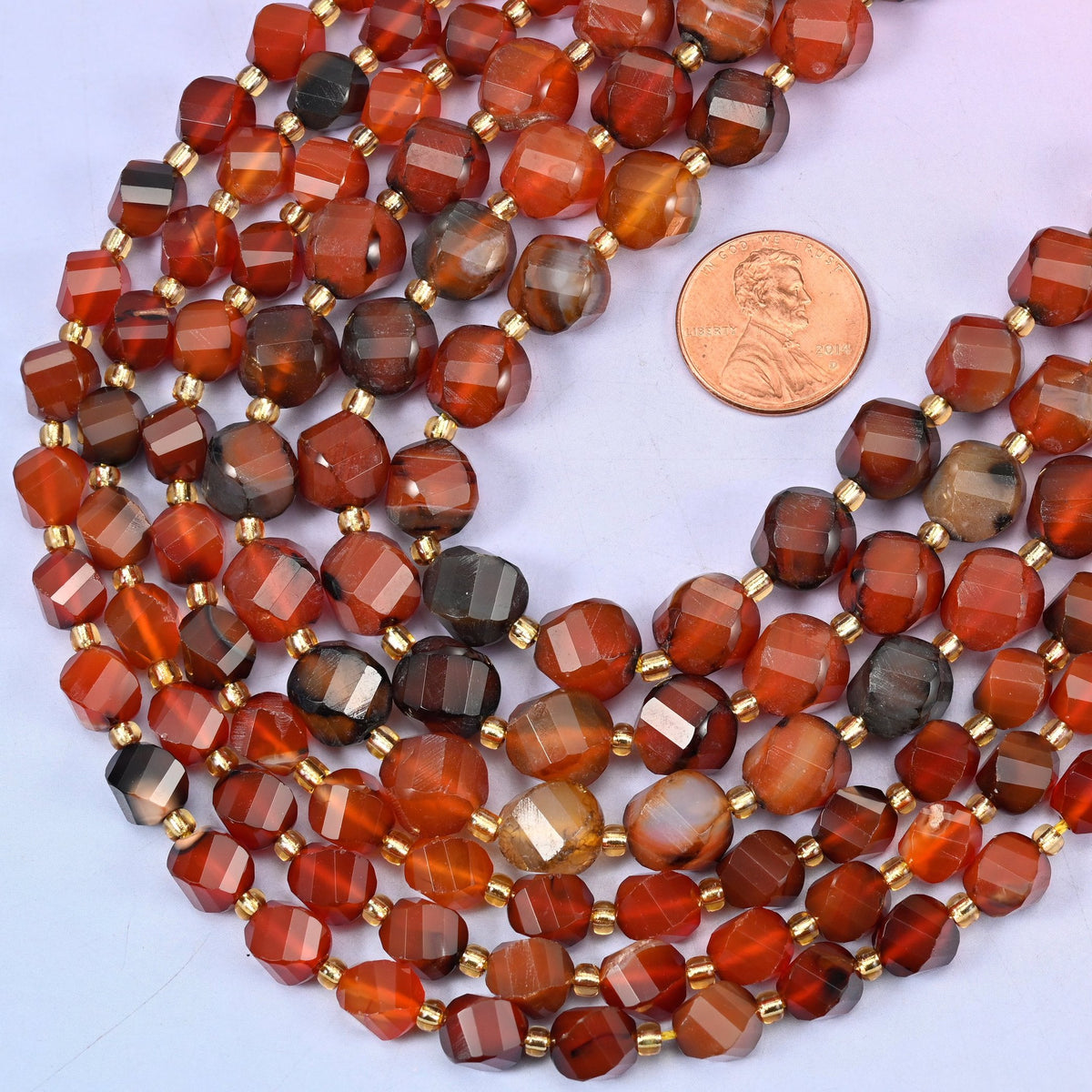 Faceted spiral twist cut Red Agate beads