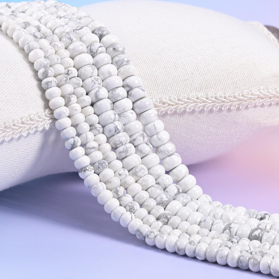 Natural White Howlite smooth rondelle beads in classic white with soft gray marbled veining