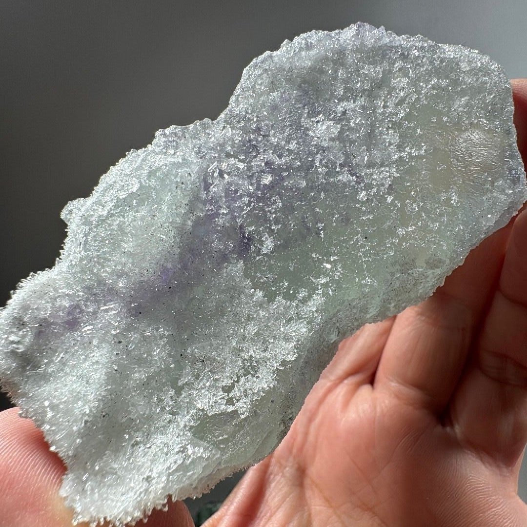 Reverse angle of the fluorite piece, sugary white quartz coating running along the upper ridge