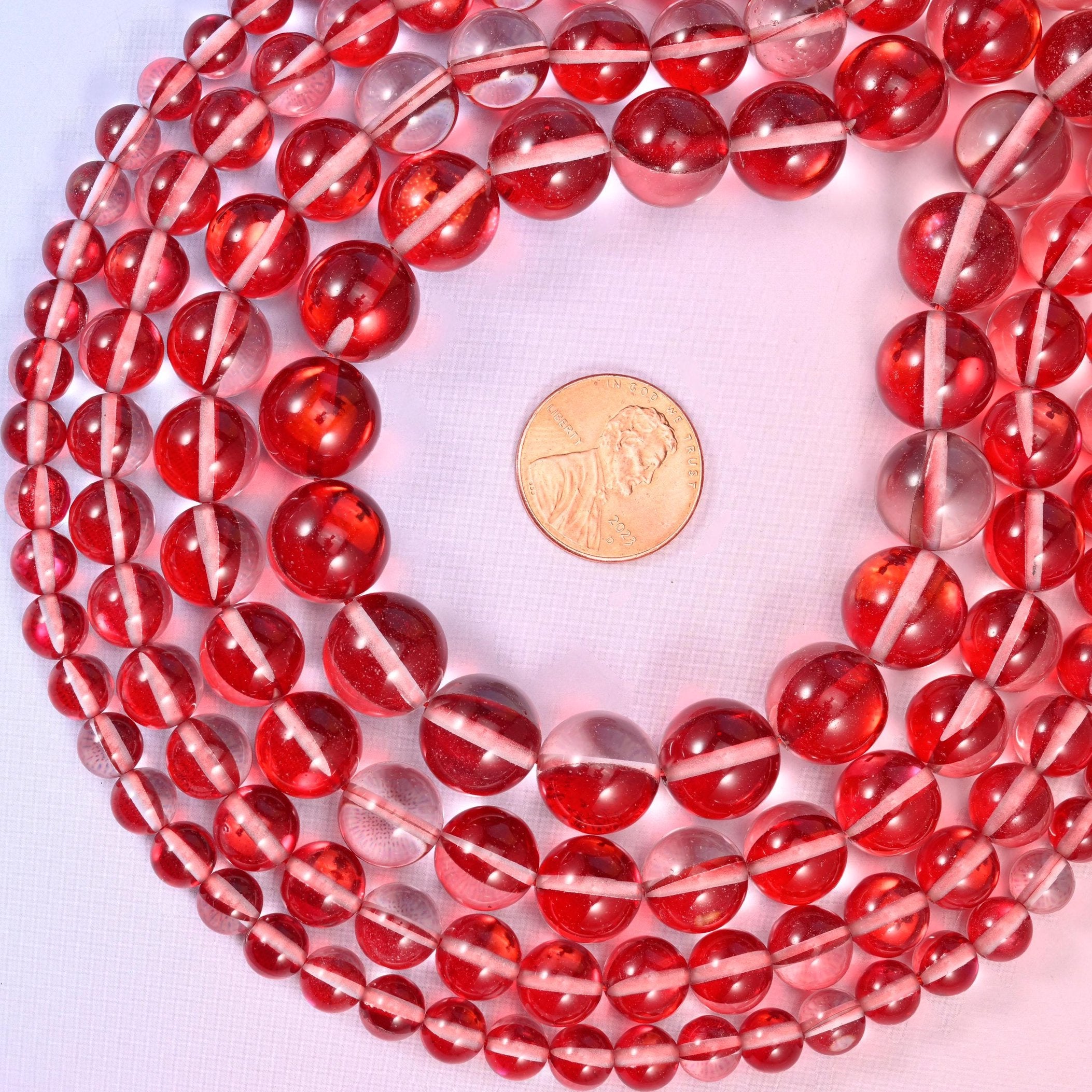 Mystic Aura Red Round Glass Beads, sold per 15 inch strand