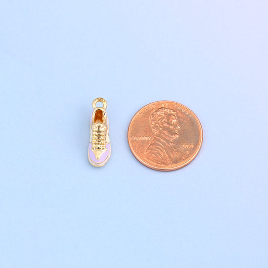 Light purple sneaker charm seen from above, shown at actual size, 17.27 x 7.48mm.