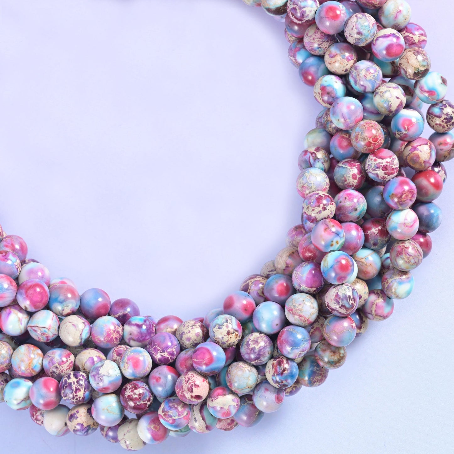 Sea sediment jasper round beads, approximately 50 beads per 15.5 inch strand