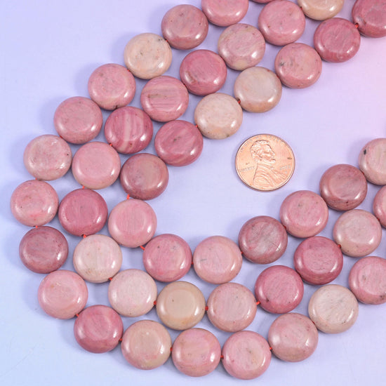 Pink Rhodonite smooth coin beads, 15 inch strand