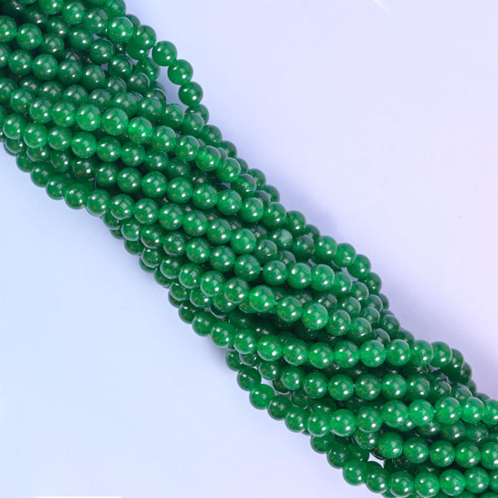 Smooth round cut dyed jade beads