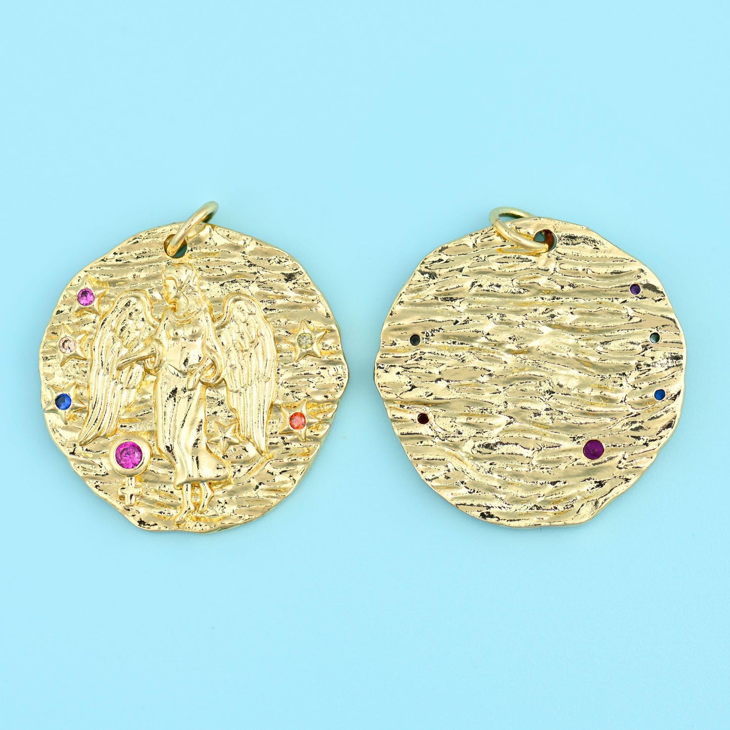 18K gold plated zodiac pendant with a winged figure motif, front and back views