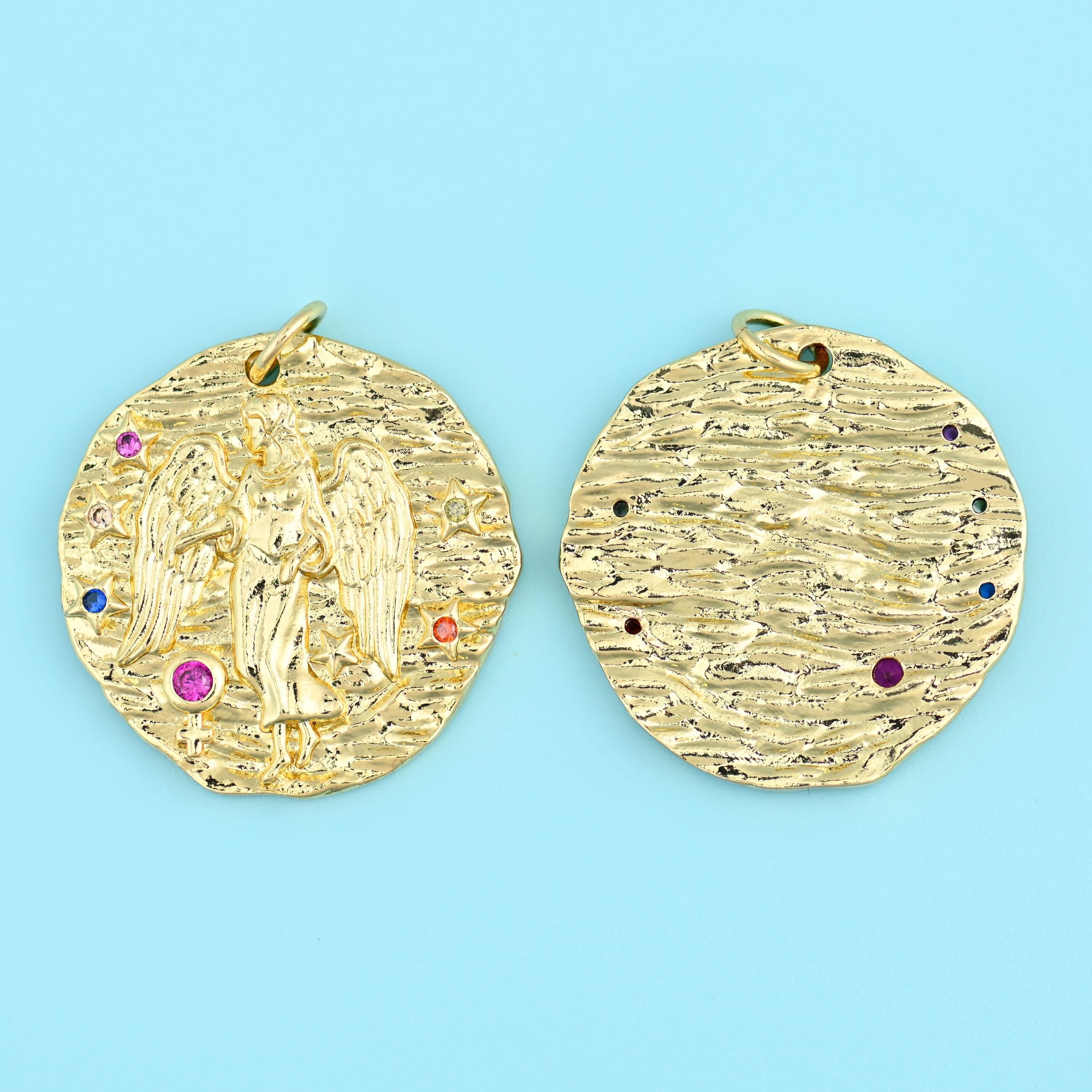 18K gold plated zodiac pendant with a winged figure motif, front and back views