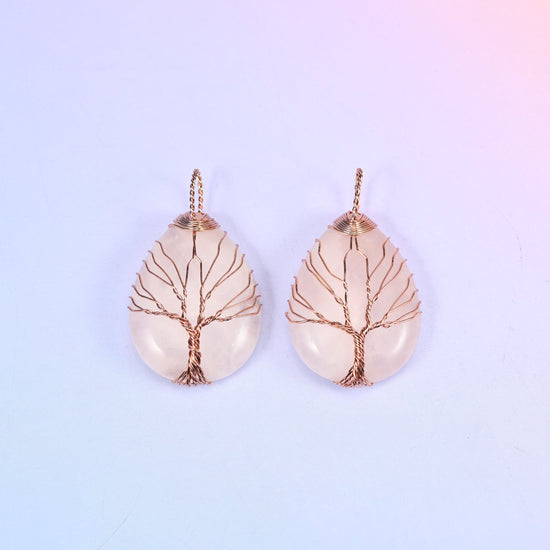 Teardrop Crystal Pendant with Copper Wired Tree in blush pink rose quartz, two pieces side by side with bare copper branches over the polished cabochon.