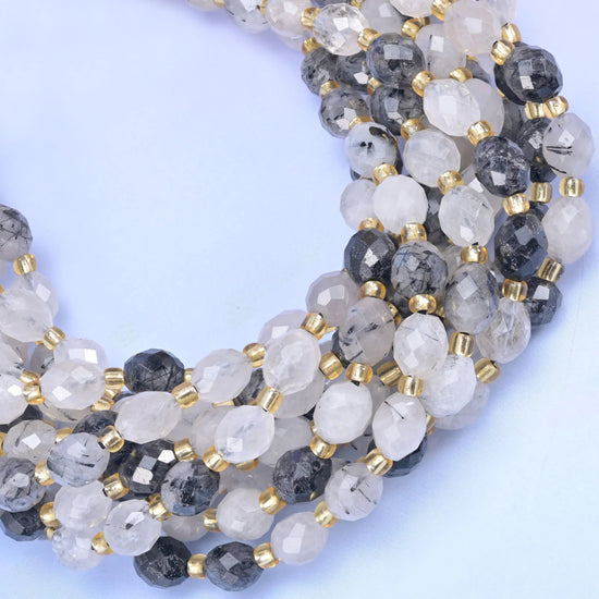 Black Rutilated Quartz Faceted Rice Barrel Beads 6x8mm, hole approximately 1.0mm with a possible variation of +/- 0.2mm