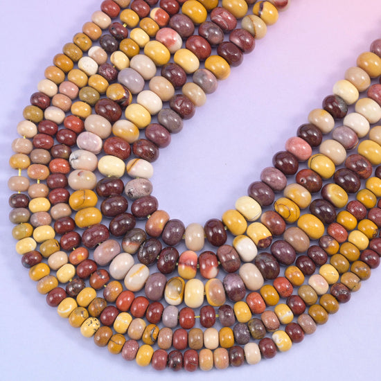 Rondelle cut Mookaite Jasper beads with a smooth polished finish